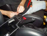 Pivot shift light controller being installed into center console