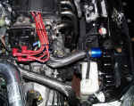 GReddy stainless steel braided hoses and Magnecor KV85s