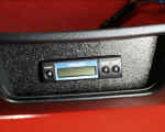 Closeup of GReddy turbo timer custom mounted into pocket