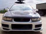 Front view with NIN Autosports carbon fiber hood and ViS Racing Sports front bumper