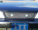 Grill and mesh custom made by Street Sports with PIAA driving lights behind mesh