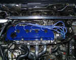 Custom finished valve cover and Stillen header with Magnecor wire set