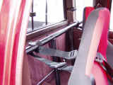 Custom welded harness bar installed in truck cab