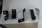 Custom brackets made and powder coated for custom installation of GReddy 14 row V-Spec oil cooler kit