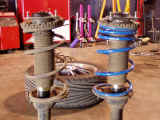 Comparison of the rear strut assemblies.  Left is original spring, while right is Espelir spring
