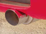 Closeup of Invidia exhaust system muffler