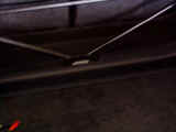 Rear strrut brace triangulated bottom mounting point